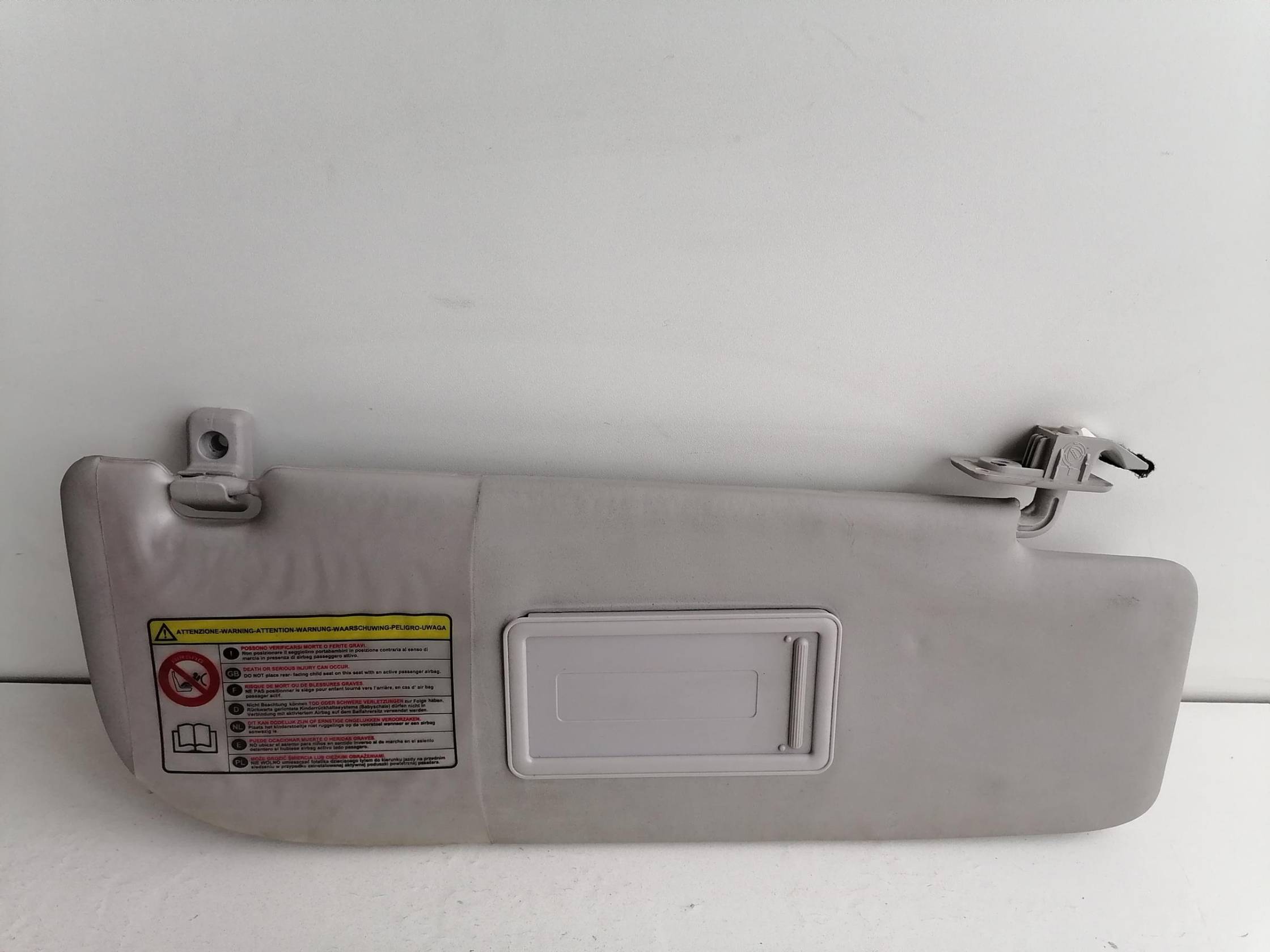 Aletta parasole parabrezza dx.